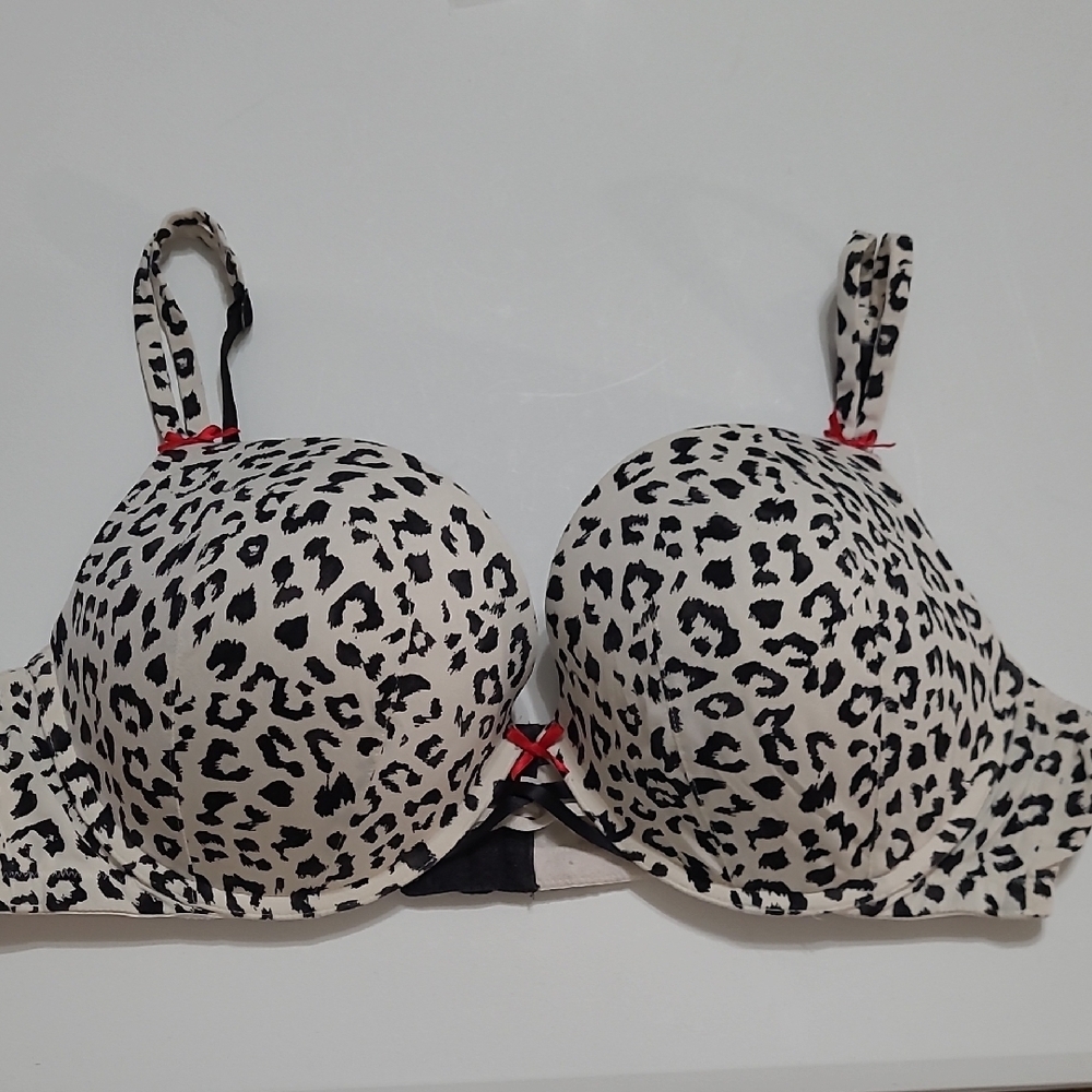 Cacique Black & White Leopard/Dalmatian Print Bra with Red Bow Accents size 46C